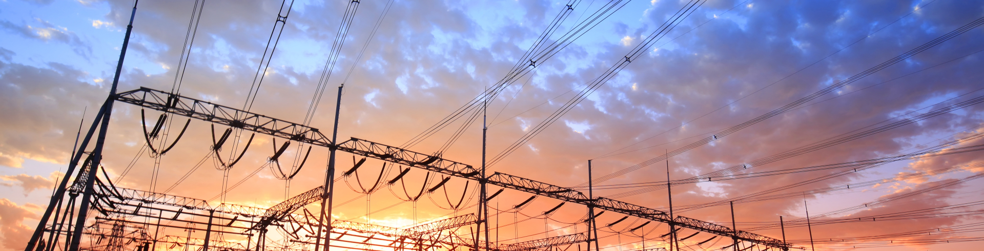 Solar photovoltaic panels and substations in the evening